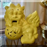D14. Yellow ceramic foo dog. 
